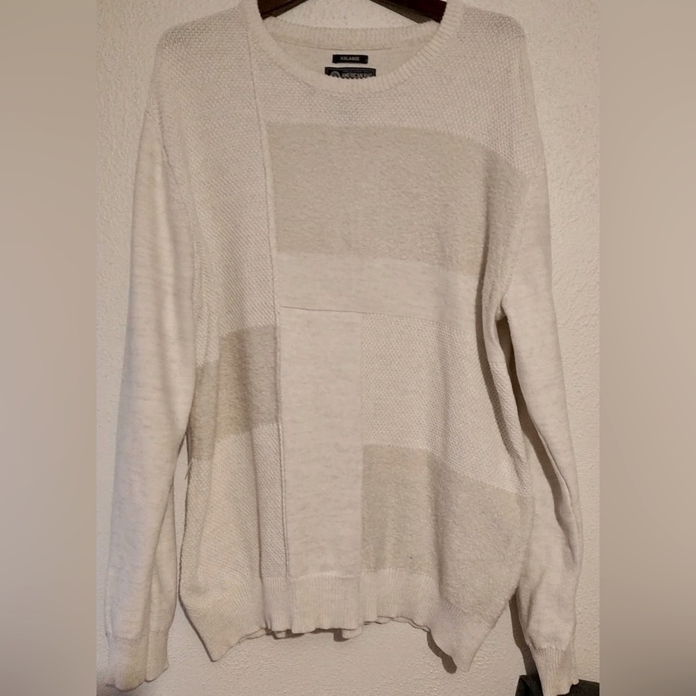 Retro Sweater in a smooth cream color.